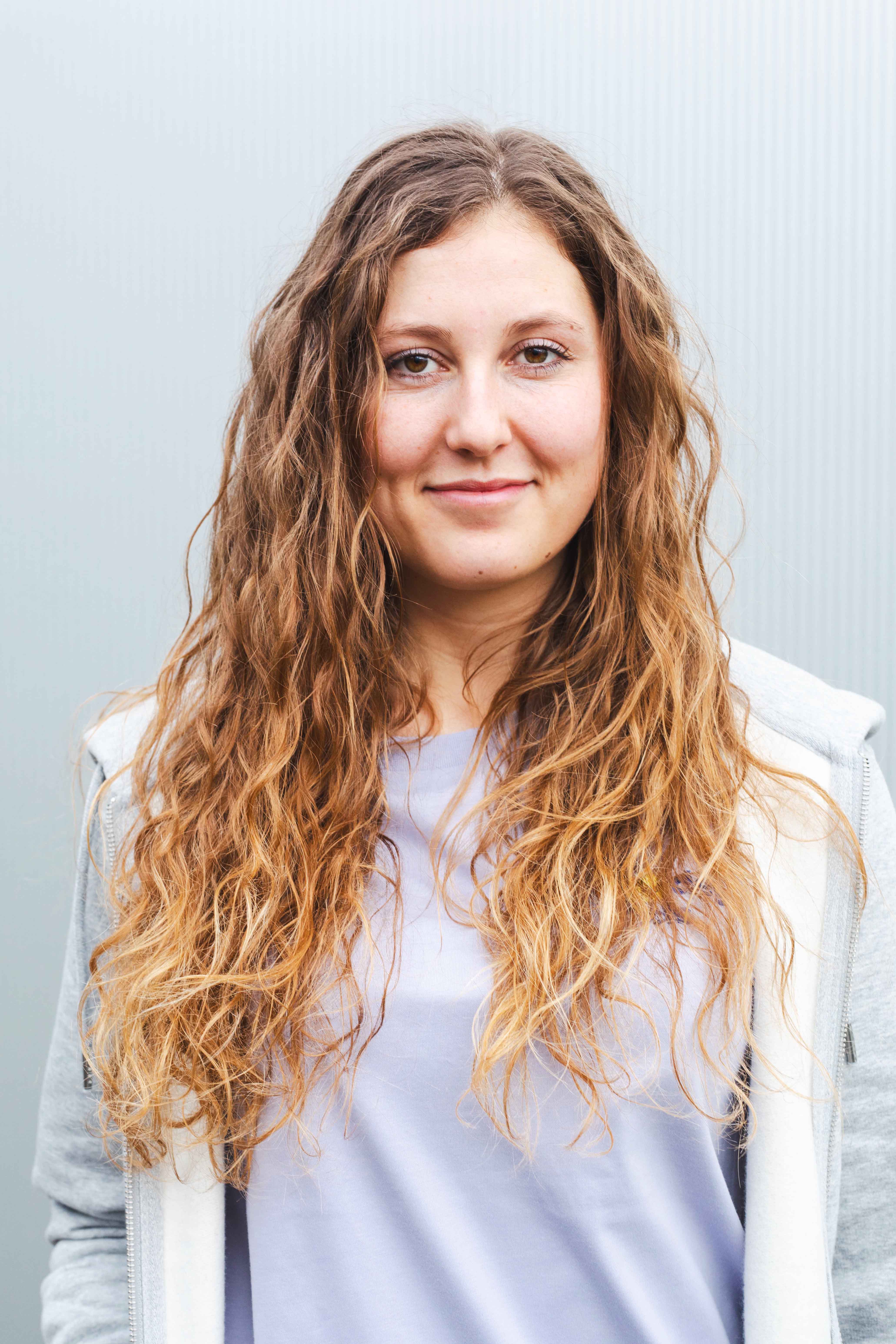 Portraitfoto von Kathrin, Orthopädietechnik-Mechanikerin.